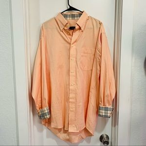 Peach Burberry button up.
